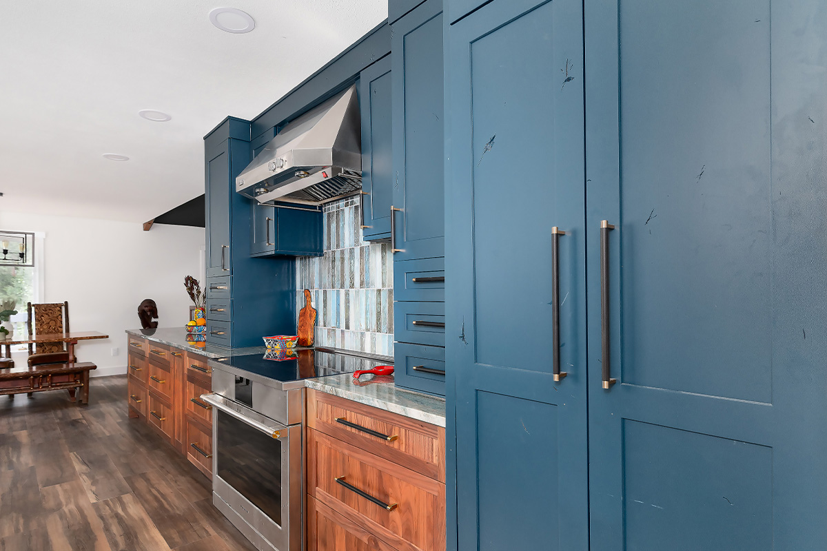 Painted blue and walnut Natural kitchen cabinets
