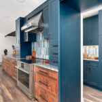 Painted blue and walnut Natural kitchen cabinets