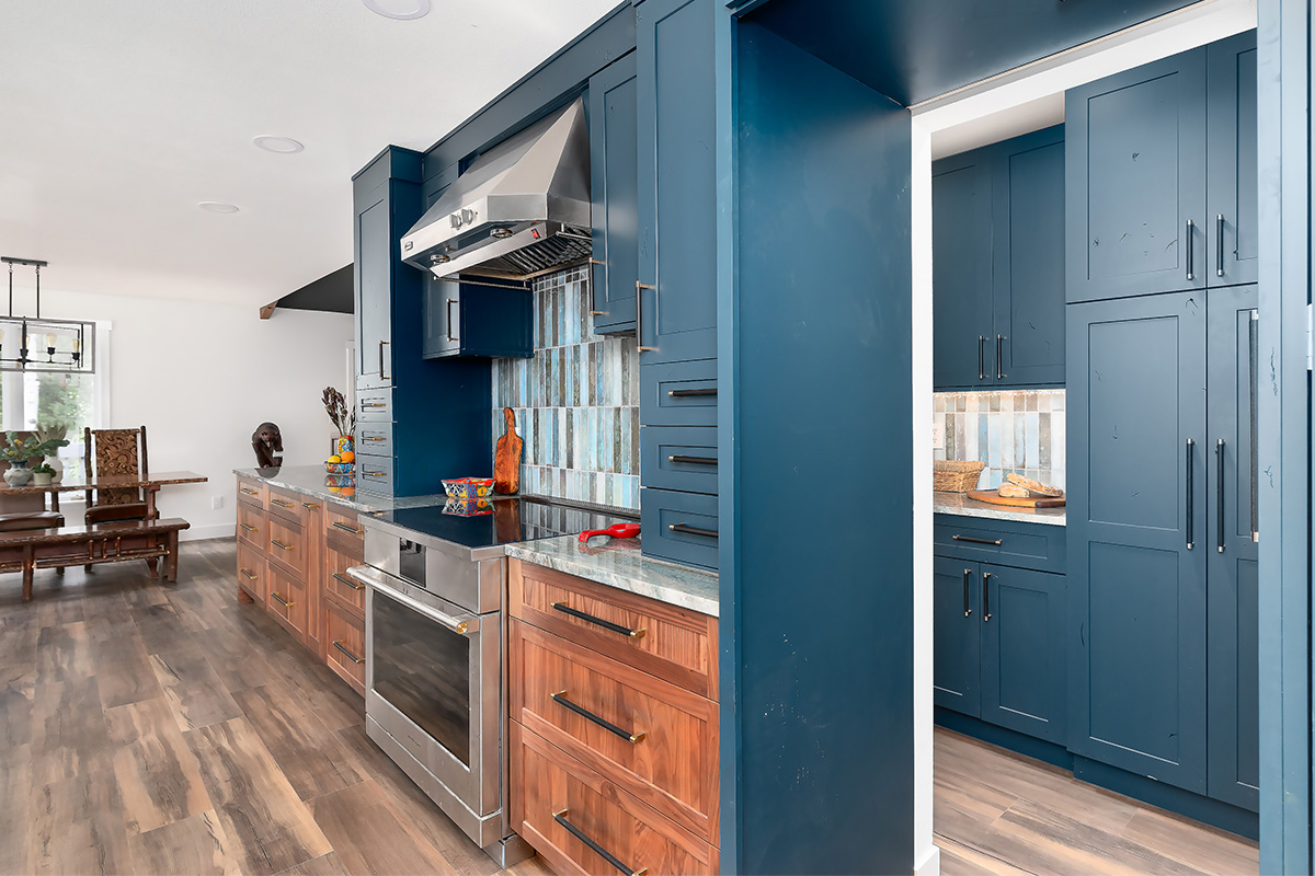 Painted blue and walnut Natural kitchen cabinets