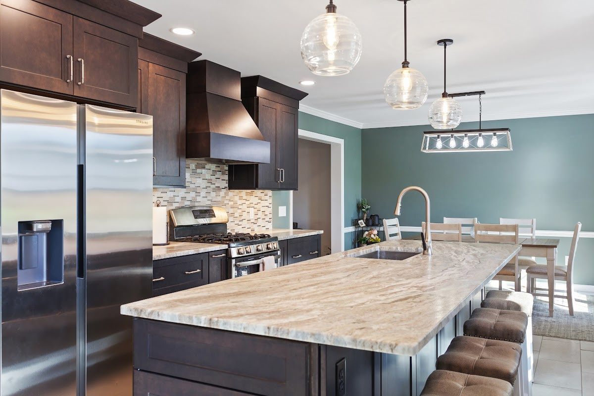 Dark stained kitchen cabinets in a galley kitchen space