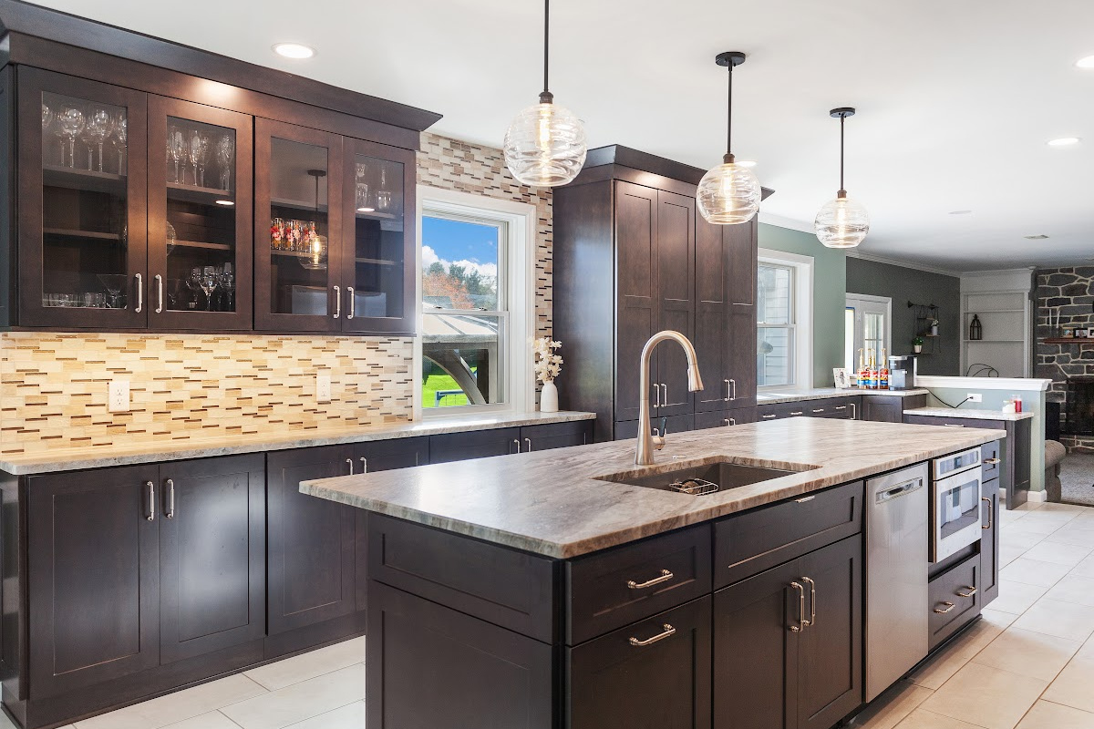 Dark stained kitchen cabinets in a galley kitchen space