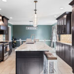 Dark stained kitchen cabinets in a galley kitchen space