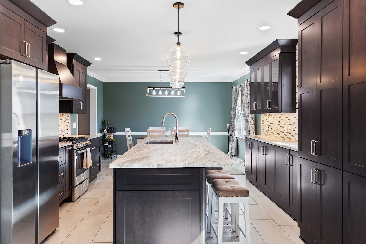 Dark stained kitchen cabinets in a galley kitchen space