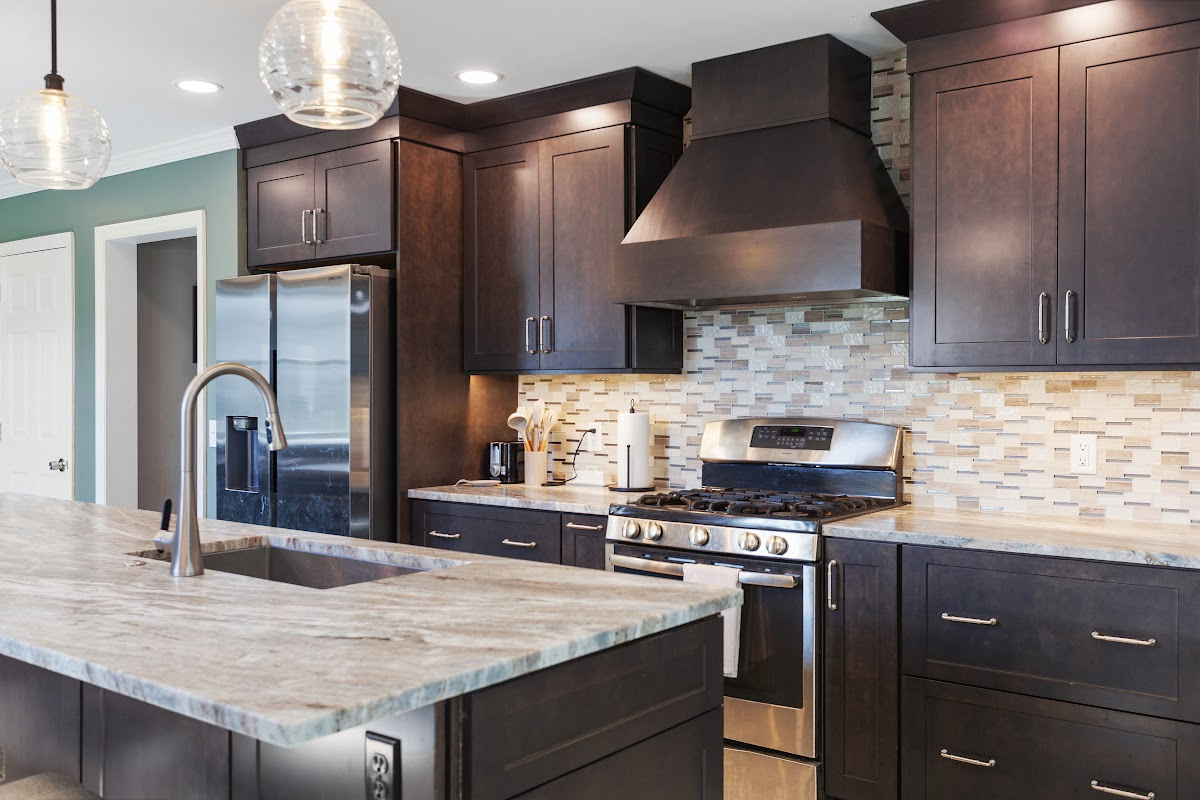 Dark stained kitchen cabinets in a galley kitchen space