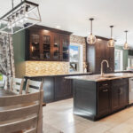 Dark stained kitchen cabinets in a galley kitchen space