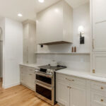 White painted kitchen cabinets.