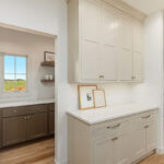 White painted kitchen cabinets.