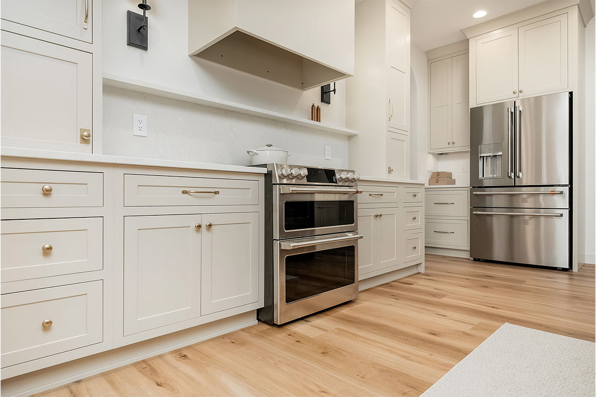White painted kitchen cabinets.