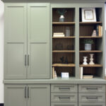Showroom home library display featuring the Wren door painted with Moss Green.