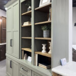 Showroom home library display featuring the Wren door painted with Moss Green.