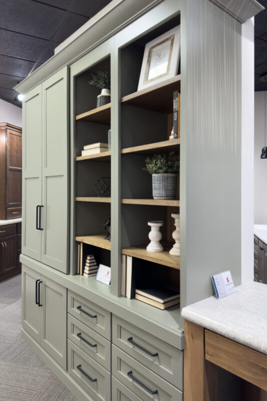 Showroom home library display featuring the Wren door painted with Moss Green.