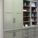 Showroom home library display featuring the Wren door painted with Moss Green.