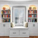 Reading nook with bench seat and bookcases on each side.