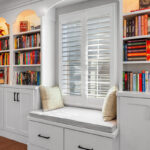 Reading nook with bench seat and bookcases on each side.