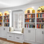 Reading nook with bench seat and bookcases on each side.