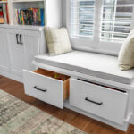 Reading nook with bench seat and bookcases on each side.