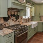 Painted kitchen cabinets in a mint green color.