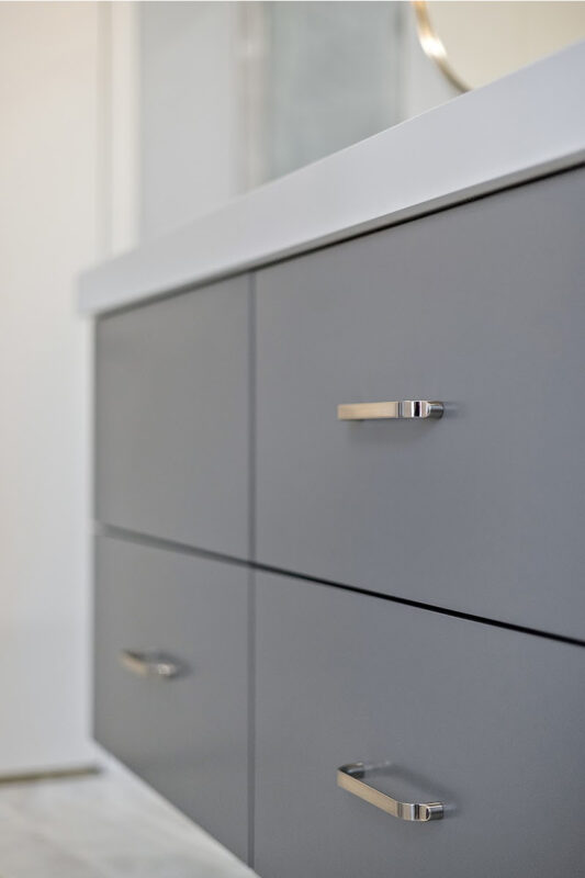 Contemporary gray painted floating vanity.