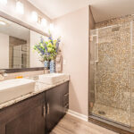Bathroom with maple midnight-stained cabinets