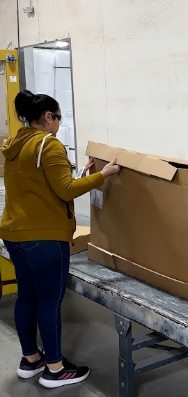Woman boxing a cabinet