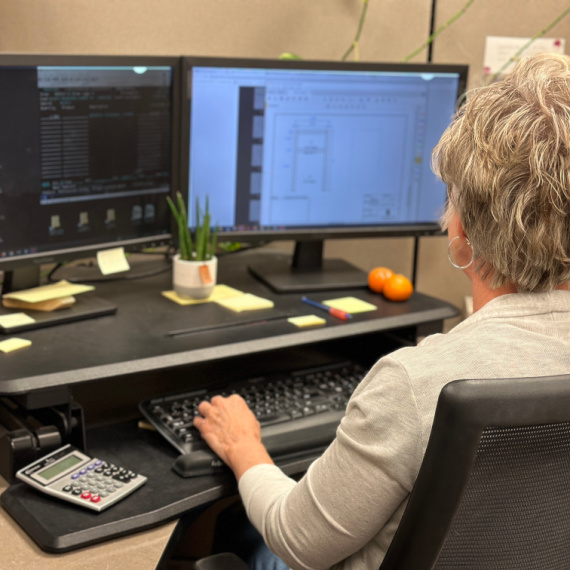 Woman in order entry at a computer