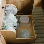 Food storage container organization accessory in a base cabinet.