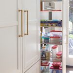 White kitchen pullout utility cabinet