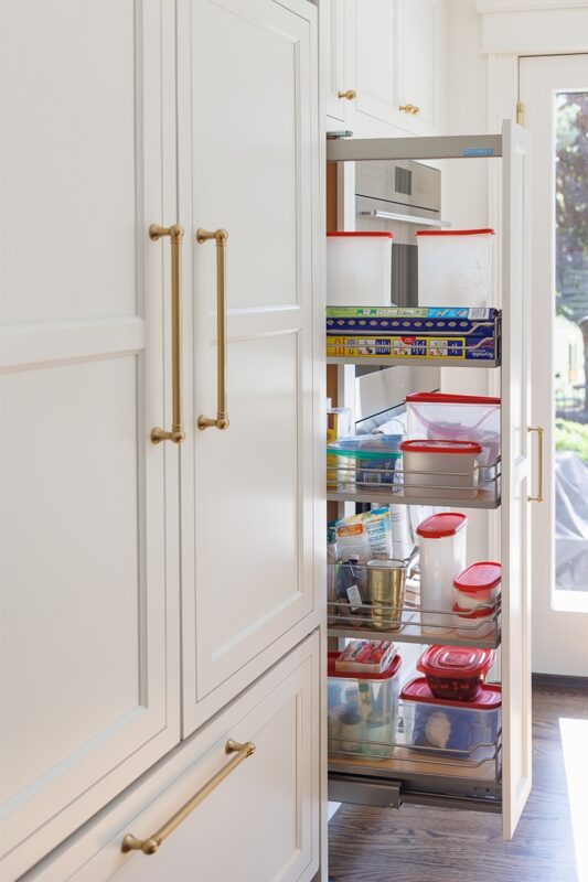 White kitchen pullout utility cabinet