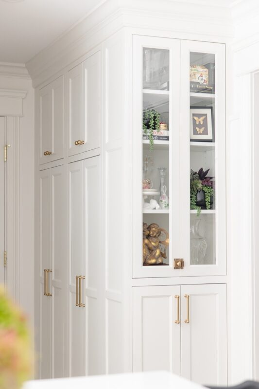 White kitchen cabinet with glass doors