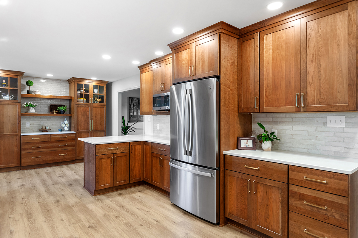 Stained kitchen cabinets with fridge