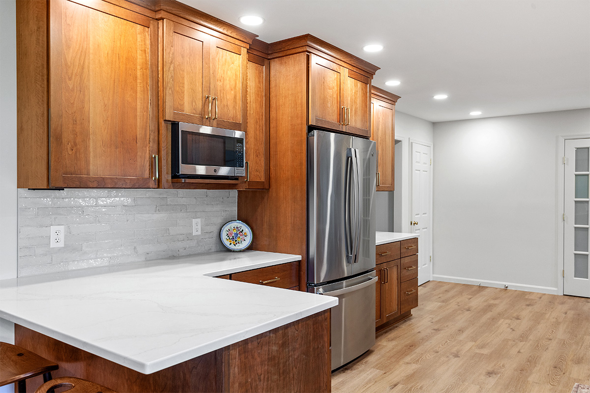 Stained kitchen cabinets with fridge