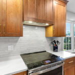 Wood hood above stove