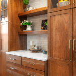 Stained cabinets with floating shelves