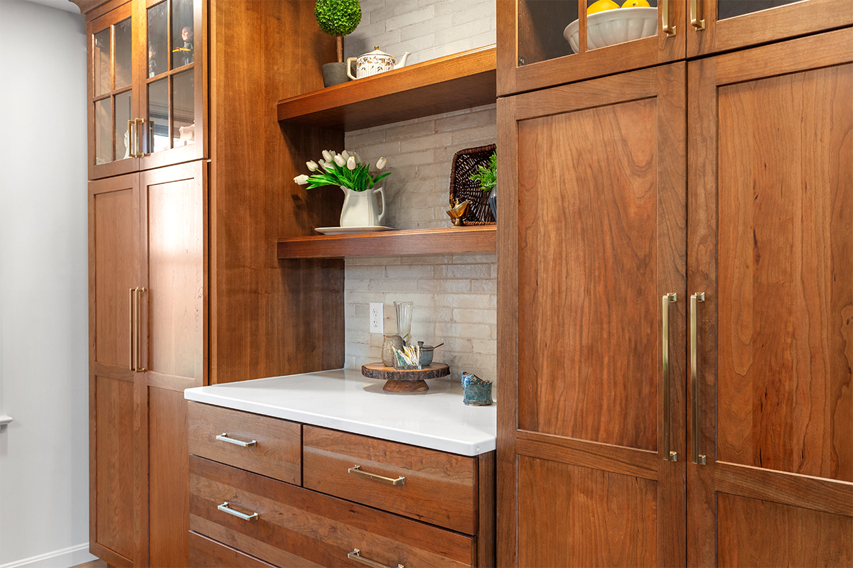 Stained cabinets with floating shelves