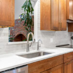 Kitchen sink below window