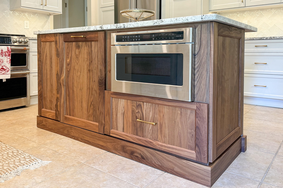 Walnut island with in-cabinet microwave