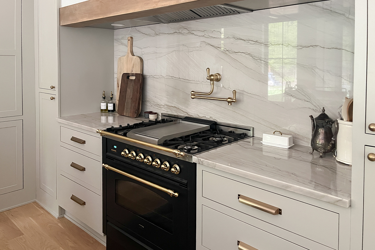 Painted kitchen cabinets with black stove