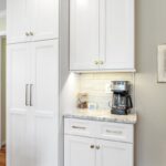 White-painted kitchen cabinets