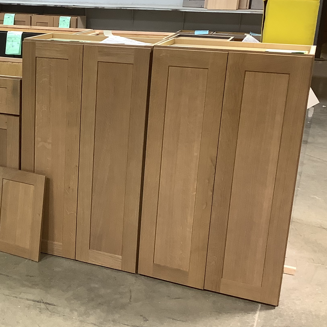 Wall cabinets in light brown Sable finish on quartersawn white oak.