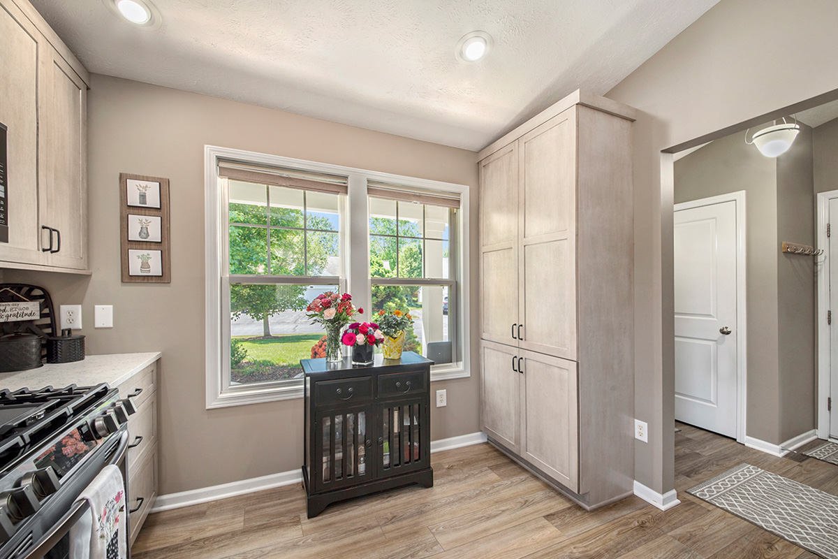 Light stained kitchen cabinets.