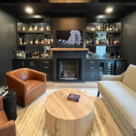 Living space with bar and fireplace.