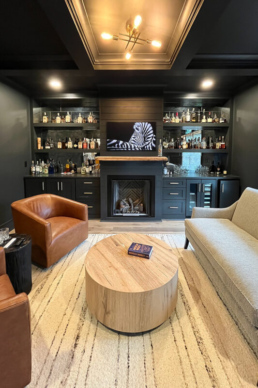 Living space with bar and fireplace.