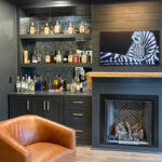 Living space with bar and fireplace.