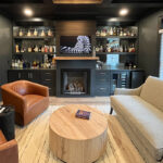 Living space with bar and fireplace.