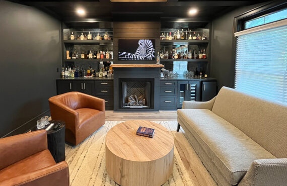 Living space with bar and fireplace.