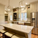 Painted cream kitchen cabinets.