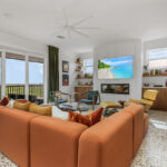 Living room space with walnut natural cabinets