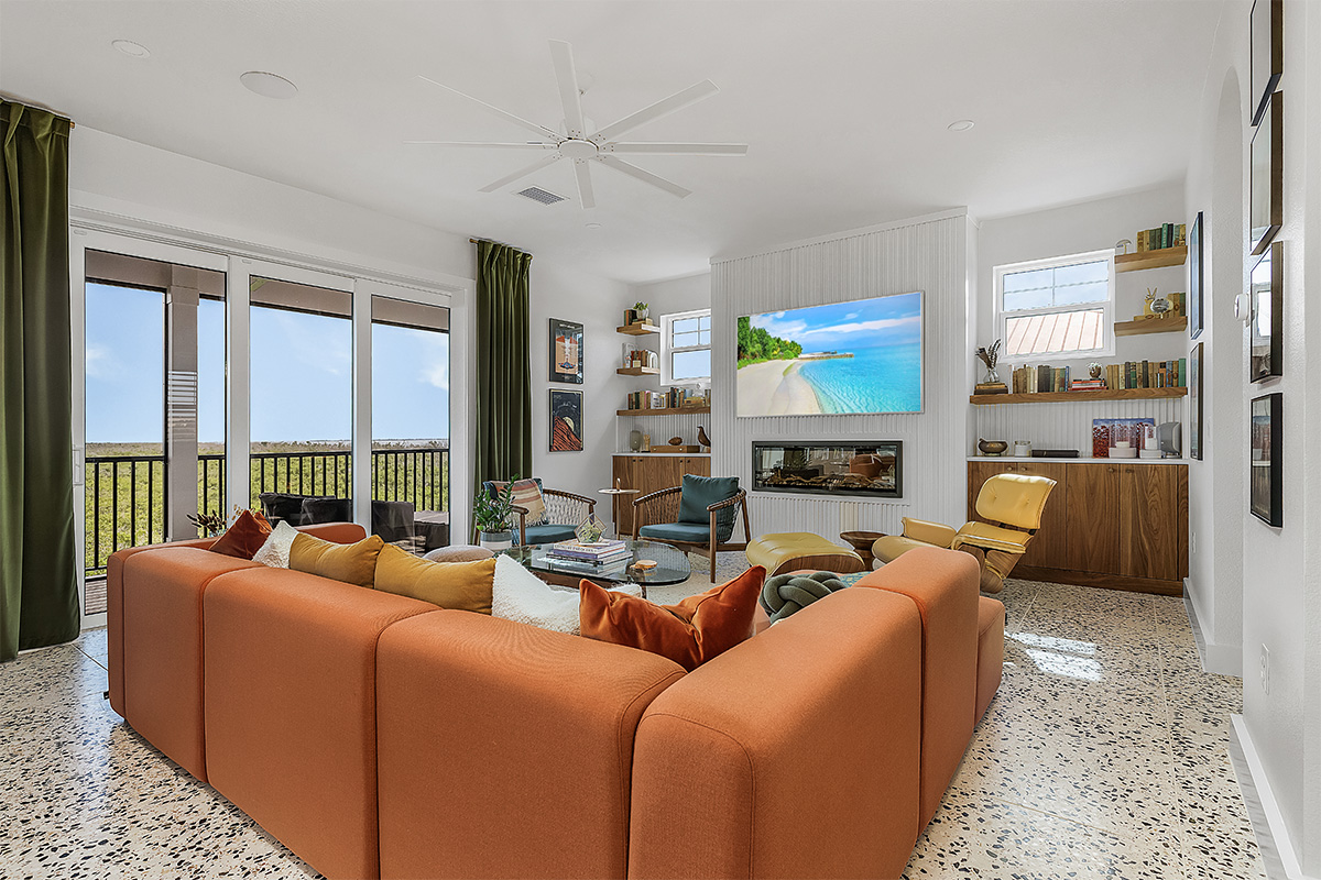 Living room space with walnut natural cabinets