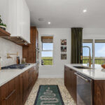 Mid-century modern kitchen in walnut natural cabinetry.