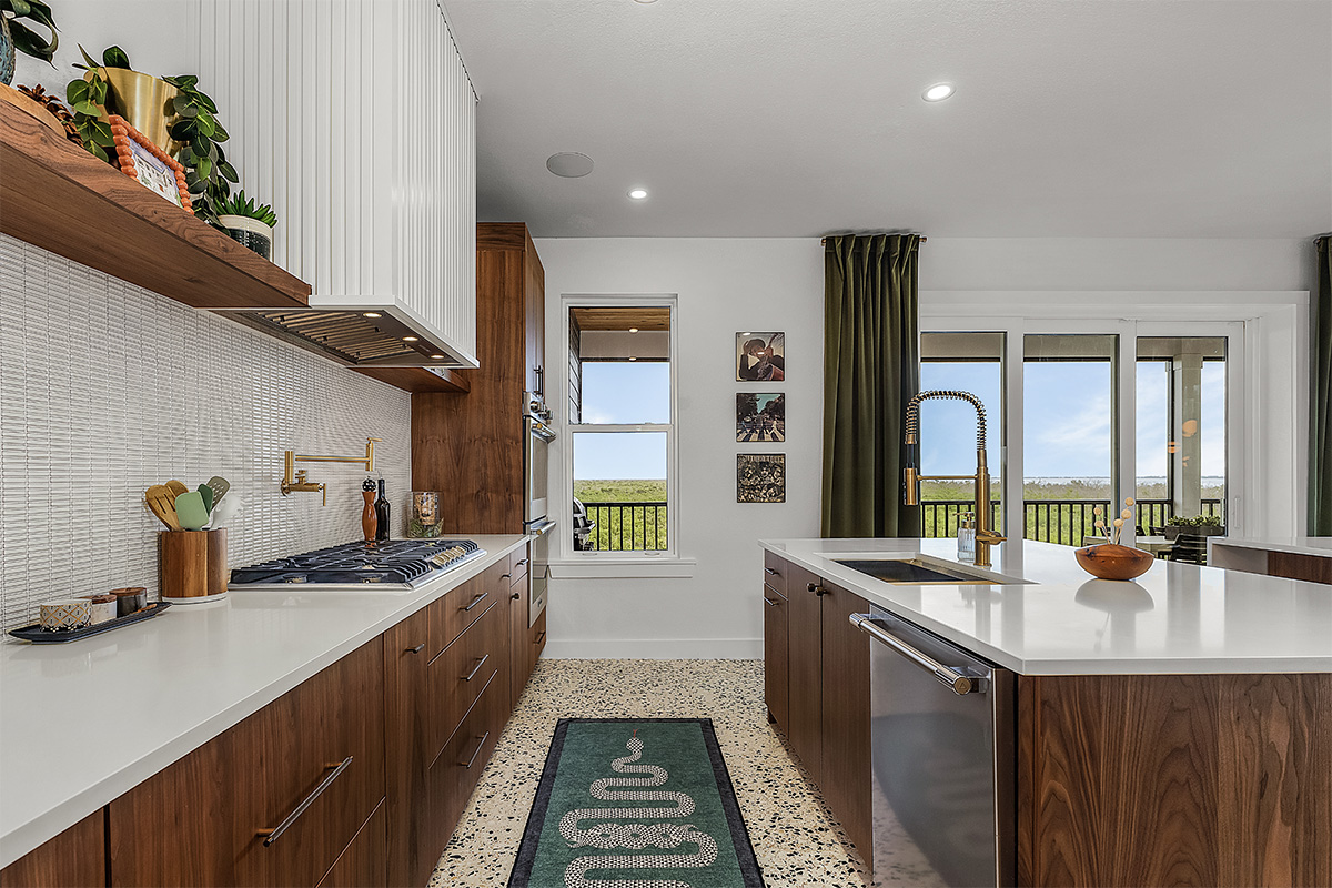 Mid-century modern kitchen in walnut natural cabinetry.